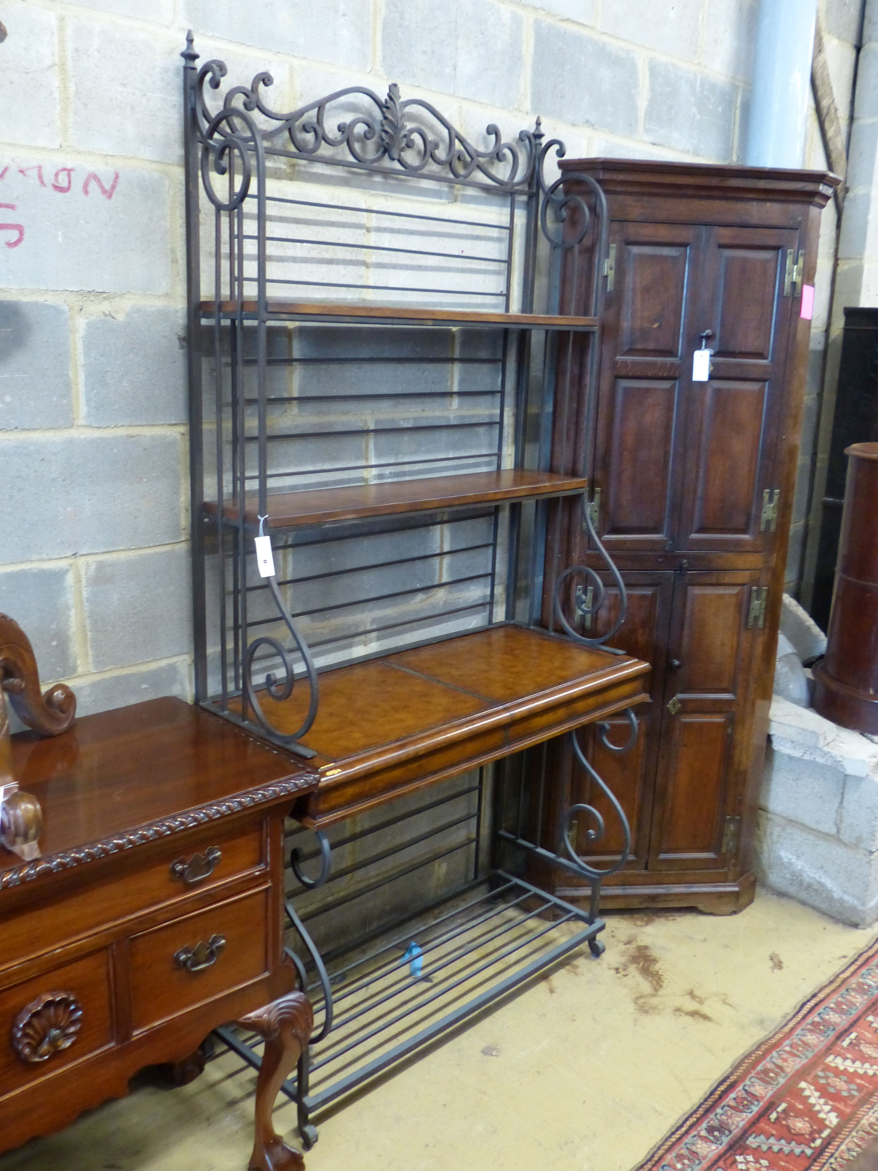 A reproduction leather mounted baker's rack, width 102cm depth 44cm height 206cm